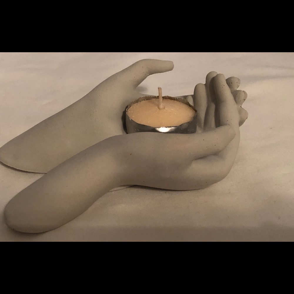 Concrete hand tea light holder